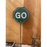 A 'STOP AND GO' ROAD TRAFFIC SIGNAL SIGN