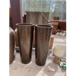 A PAIR OF DECORATIVE BROWN FIBRE GLASS PLANTERS (H:100CM)