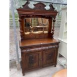A LATE VICTORIAN MIRROR BACK SIDEBOARD WITH CARVED PANEL DOORS AND TWO DRAWERS TO THE BASE, 47" WIDE