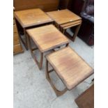 A RETRO (BELIEVED G PLAN) TEAK NEST OF THREE TABLES