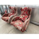 A PAIR OF FAMA LENNY SWIVEL CHAIRS ON CHROME BASES WITH WING BACKS