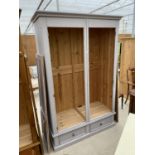 A MODERN PAINTED PINE TWO DOOR WARDROBE WITH TWO DRAWERS TO THE BASE 57" WIDE