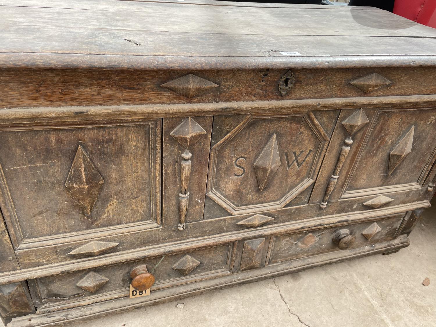 A GEORGE III OAK BLANKET CHEST WITH THREE PANEL FRONT BEARING INITIALS S.W AND DRAWER TO BASE, 50" - Image 3 of 5