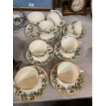 A ROYAL WORCESTER TEA SET OF SIX CUPS/SAUCERS INCLUDING A CREAM JUG,SUGAR BOWL AND SERVING PLATE