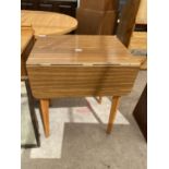 A MID 20TH CENTURY DROP-LEAF KITCHEN TABLE