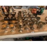 A COLLECTION OF GOBLETS AND TANKARDS OF VARIOUS SIGNS