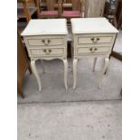 A PAIR OF MODERN CREAM AND GILT BEDSIDE CHESTS