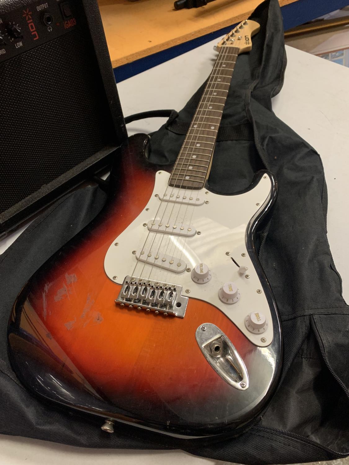 AN ION ELECTRIC GUITAR WITH CARRYING CASE AND AMPLIFIER - Image 2 of 5