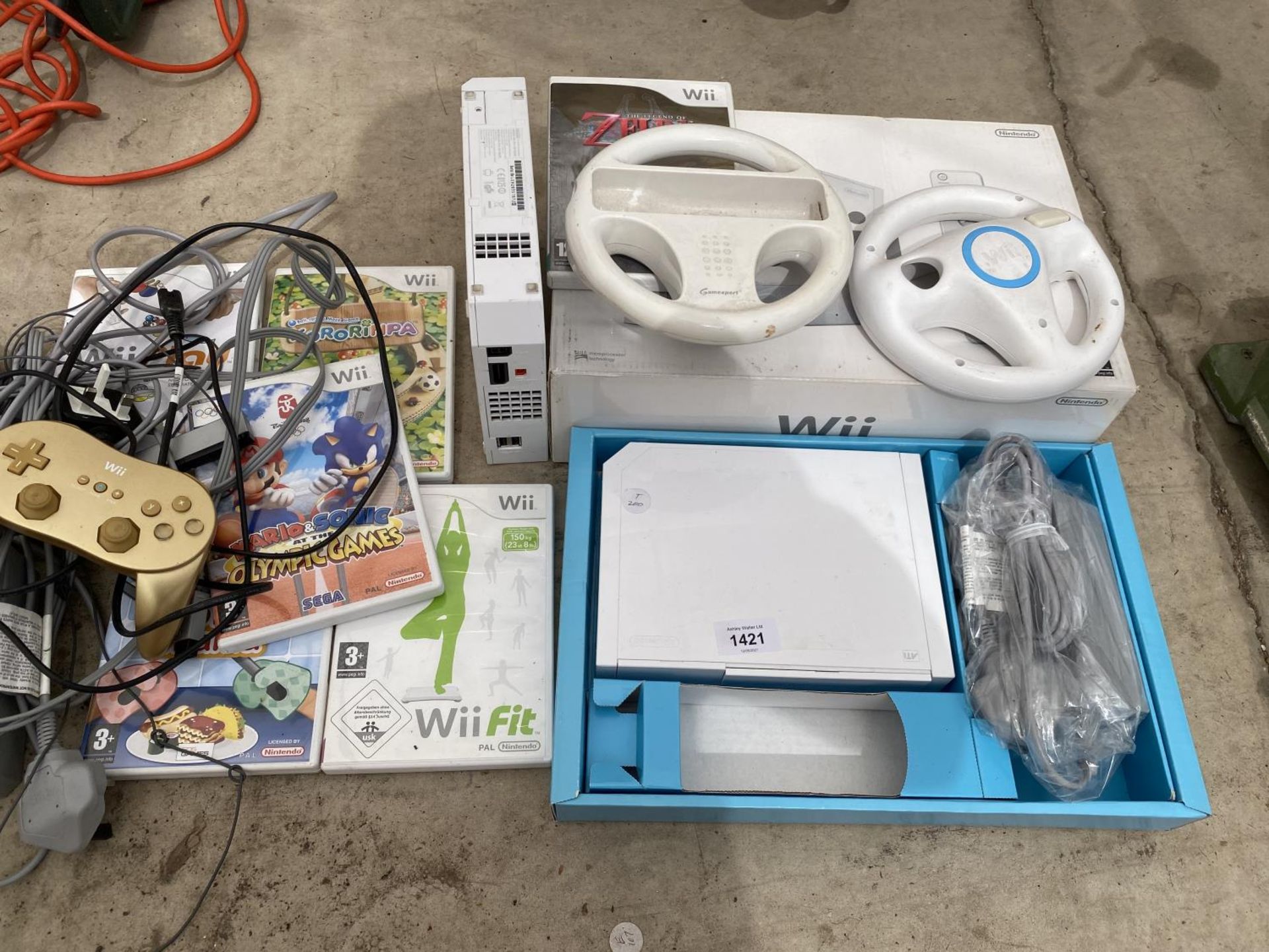 TWO NINTENDO WIIS A WII FIT BOARD AND A WII GUITAR HERO AND A QUANTITY OF GAMES - Image 2 of 4