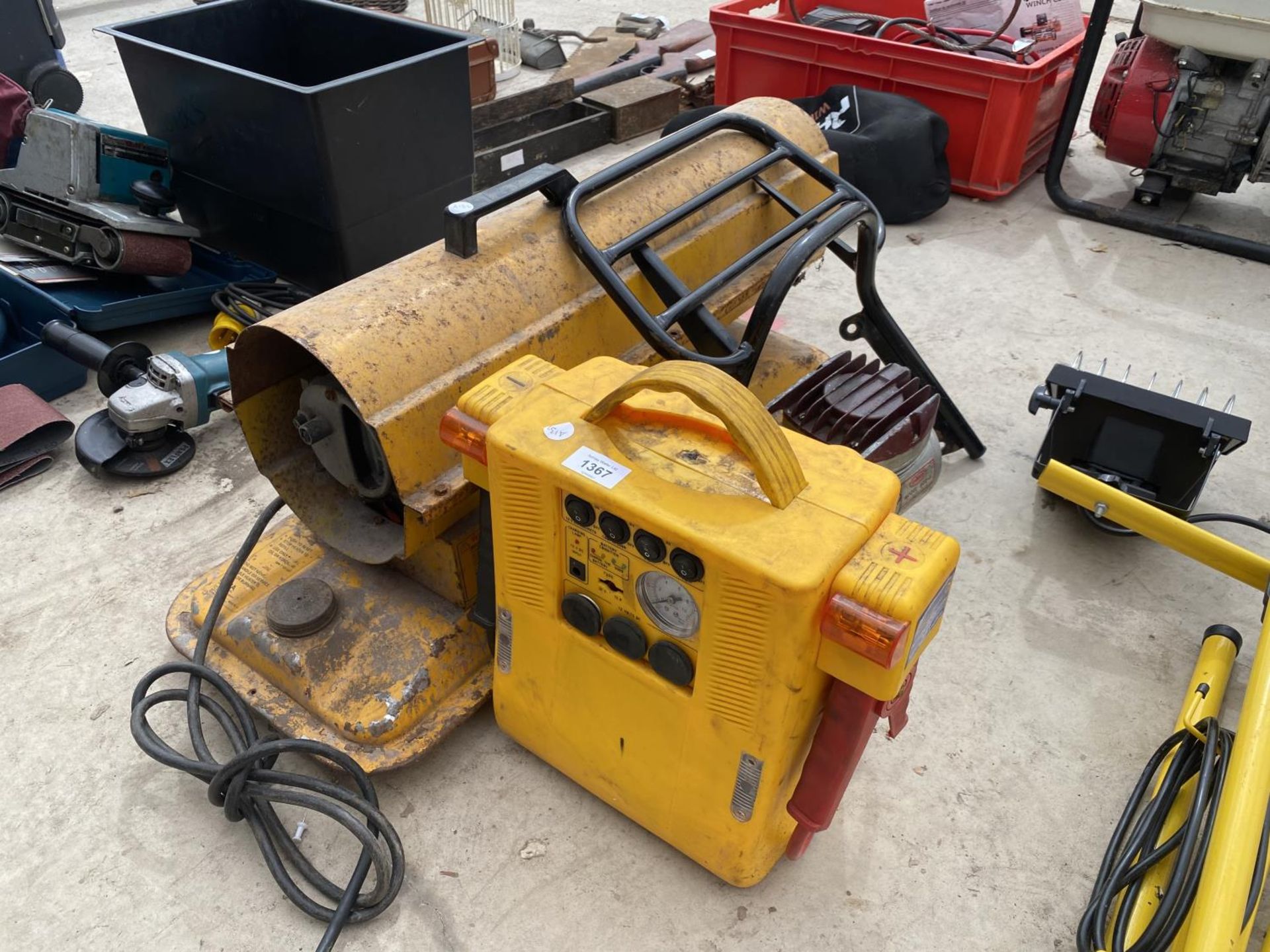 AN ASSORTMENT OF ITEMS TO INCLUDE A SPACE HEATER, A JUMP START BOOSTER AND A SPRAYIT COMPRESSOR