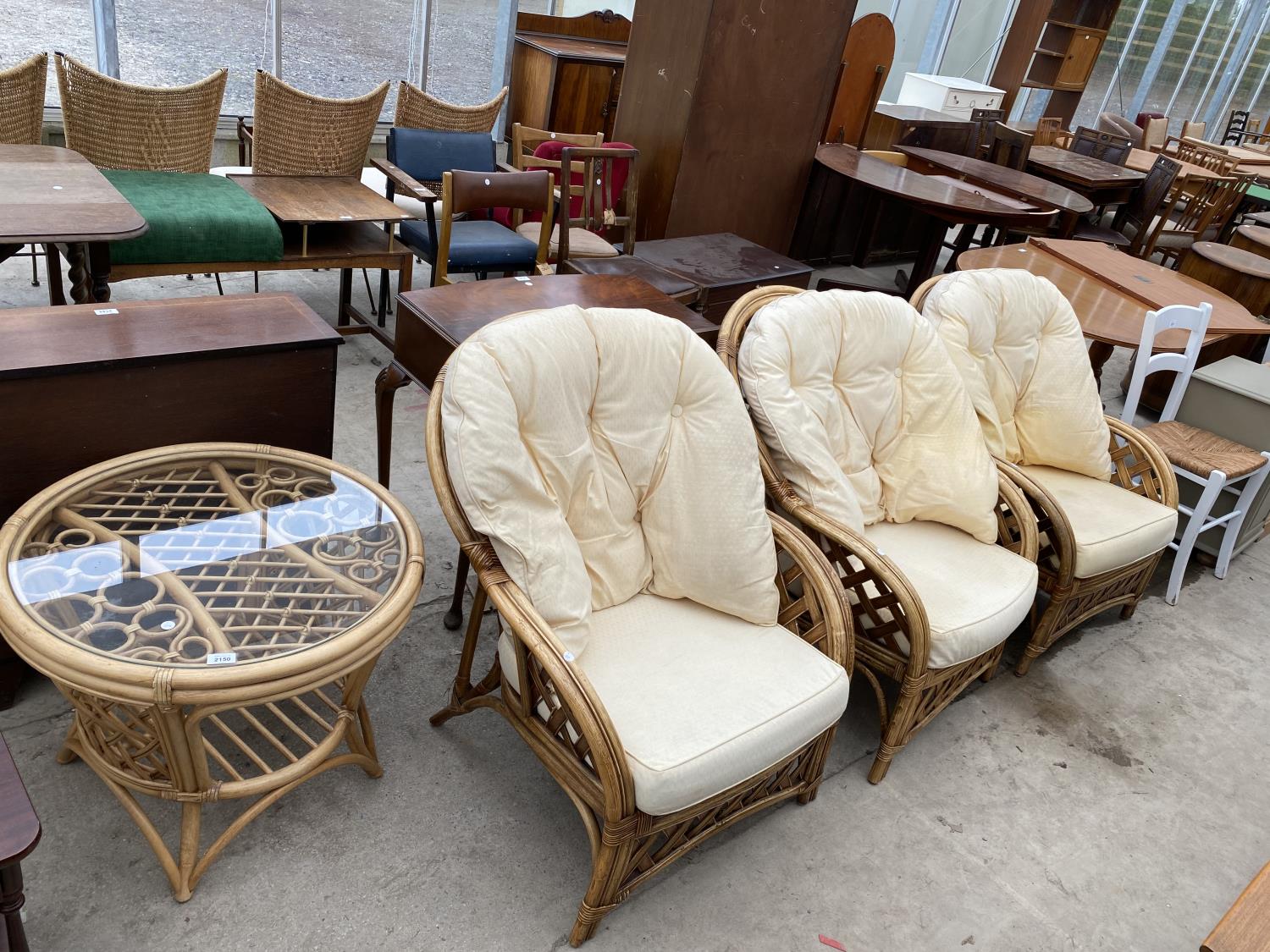 THREE BAMBOO AND WICKER CONSERVATORY CHAIRS AND CIRCULAR TABLE