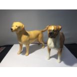 TWO BESWICK DOGS TO INCLUDE A BOXER AND A GOLDEN LABRADOR