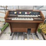 A HOWARD 245 ELECTRIC ORGAN BELIEVED IN WORKING ORDER BUT NO WARRANTY