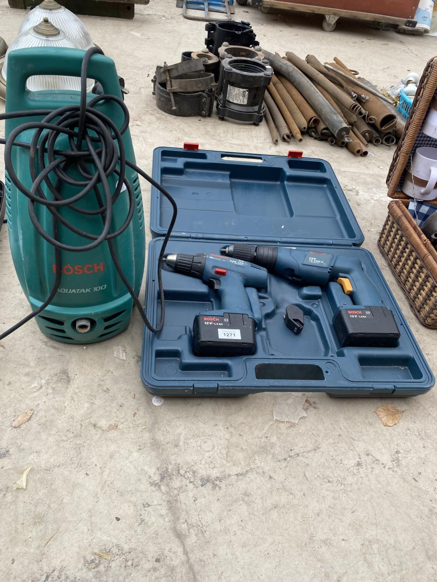 TWO BOSCH DRILLS AND A BOSCH ELECTRIC PRESSURE WASHER