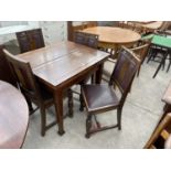 AN EARLY 20TH CENTURY OAK FOLD-OVER DINING TABLE WITH SCISSOR ACTION MECHANISM (PATENT NO.382428)