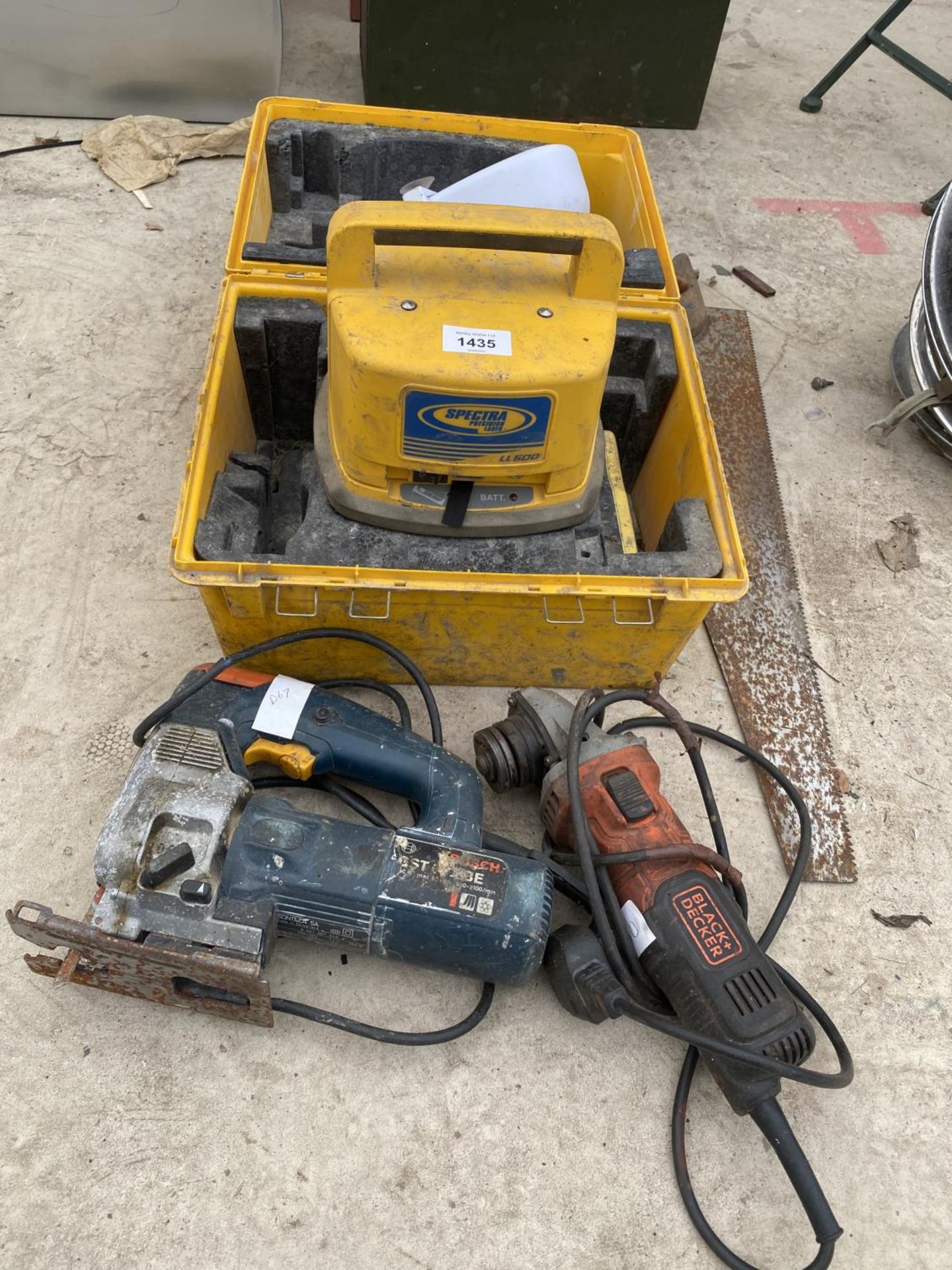 A SPECTRA LASER LEVEL, A BOSCH JIGSAW AND A BLACK AND DECKER GRINDER