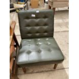 A FAUX LEATHER 1970'S BUTTONED OFFICE CHAIR
