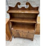 A 19TH CENTURY STYLE WATERFVALL BOOKCASE WITH DRAWERS AND CUPBOARDS TO THE LOWER PORTION, 29" WIDE