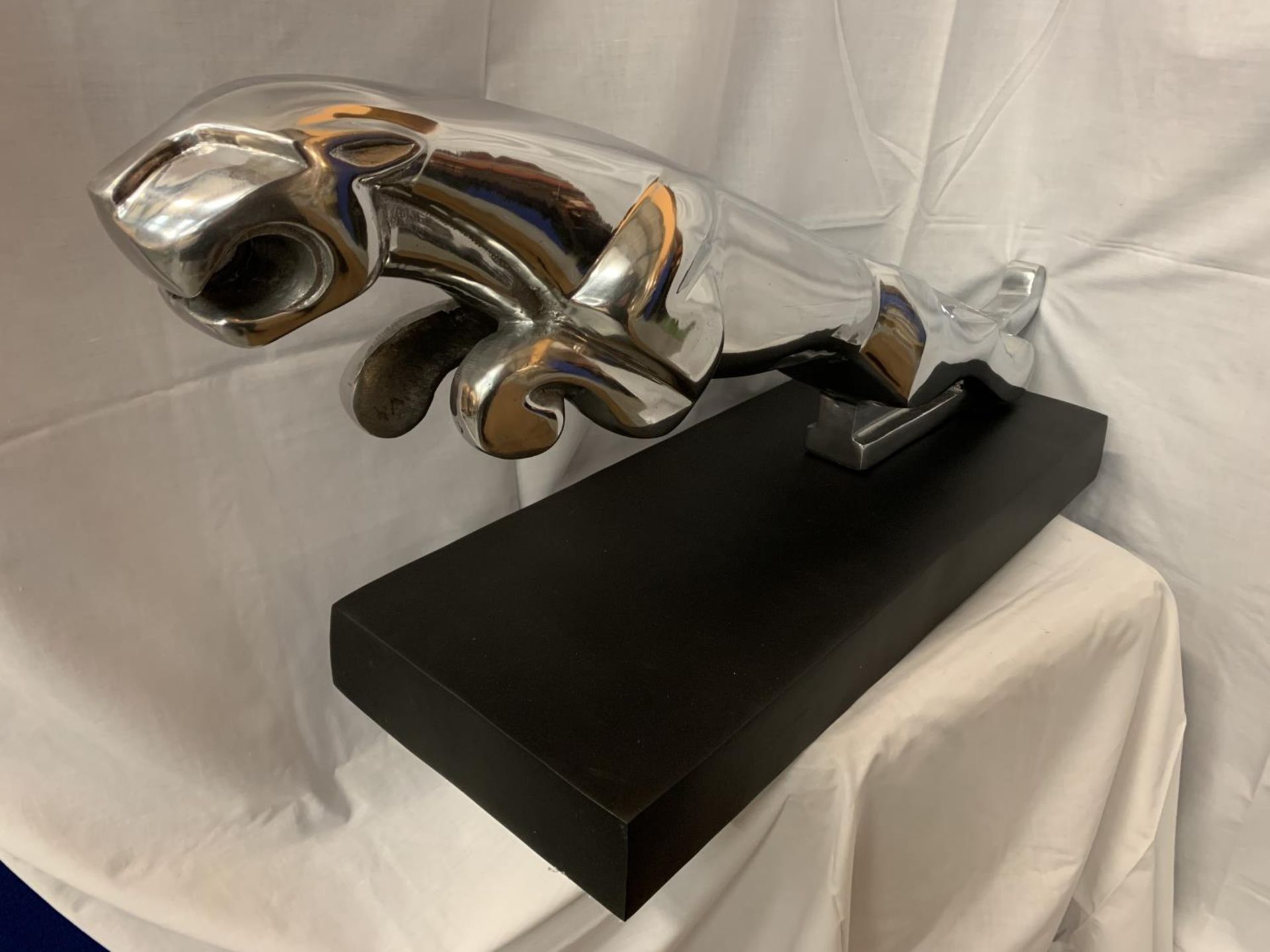 A LARGE CHROME JAGUAR CAR MASCOT MOUNTED ON A BLACK METAL BASE 74CM X 29CM - Image 2 of 2