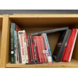 AN ASSORTMENT OF FOOTBALL BOOKS TO INCLIUDE A LARGE NUMBER OF MANCHESTER UNITED YEAR BOOKS, TWO