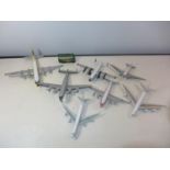 SEVEN PAINTED MODEL PLANES AND A BUS