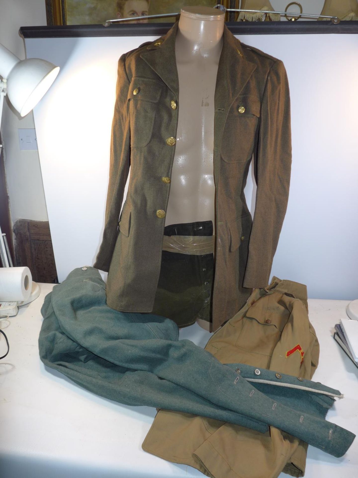 A MID 20TH CENTURY U.S ARMY JACKET , FURTHER JACKET AND A PAIR OF GERMAN ARMY TROUSERS {3}