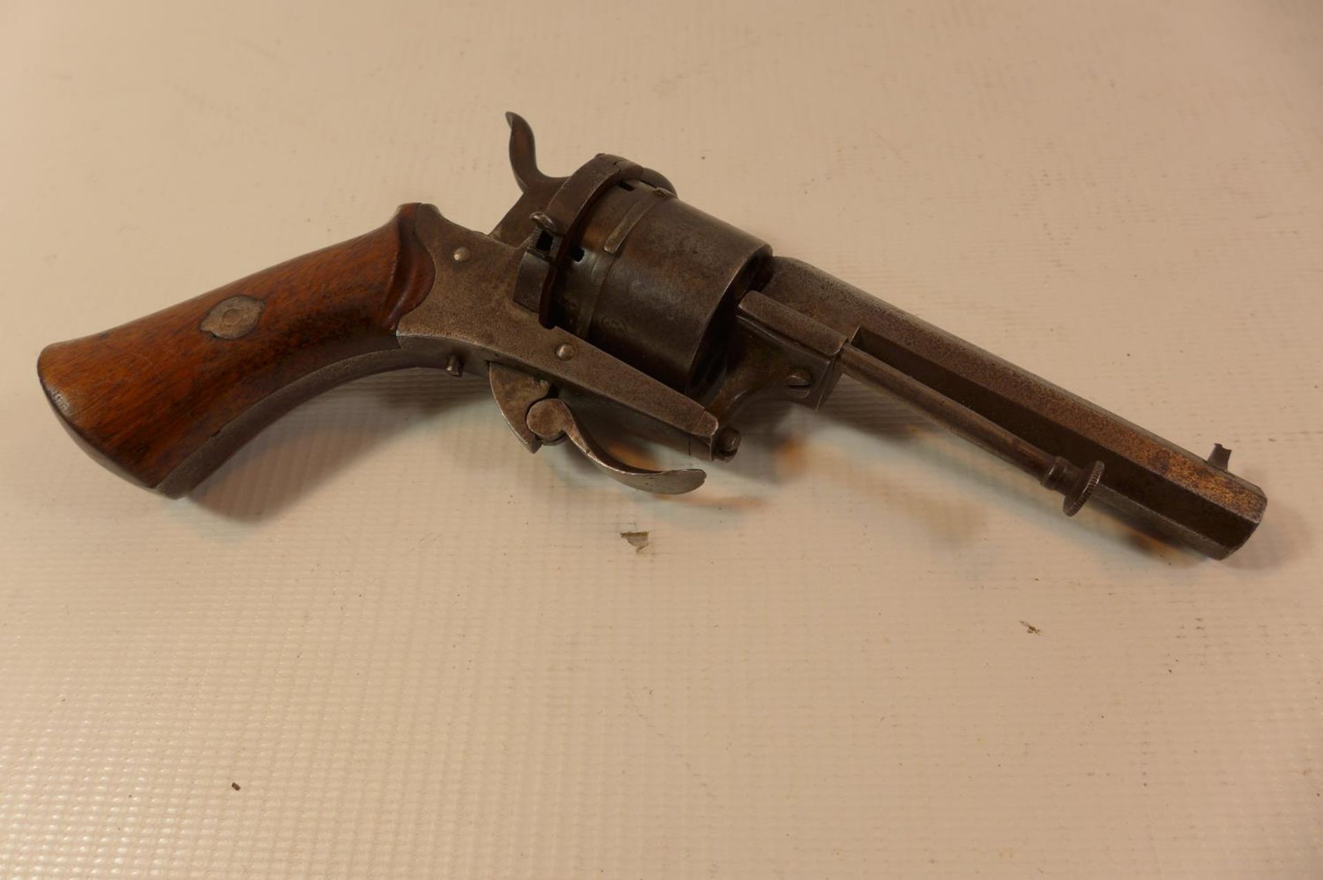 A SIX SHOT 7.65 CALIBRE PINFIRE REVOLVER WITH AN 8.5CM BARREL AND FOLDING TRIGGER