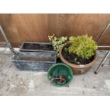 AN ASSORTMENT OF GARDEN PLANTERS TO INCLUDE A ROUND CERAMIC PLANTER AND TWO WINDOW BOXES ETC