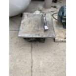 AN ELECTRIC TILE CUTTER