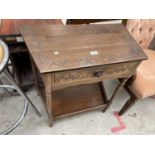 A REPRODUCTION OAK STYLE SIDE TABLE WITH SINGLE DRAWERS, 28.5" WIDE