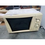 A WHITE MICROWAVE OVEN