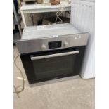 A SILVER AND BLACK BOSCH INTERGRATED OVEN BELIEVED IN WORKING ORDER BUT NO WARRANTY