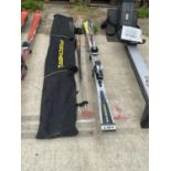 TWO FISCHER SKIS, POLES AND CARRY BAG