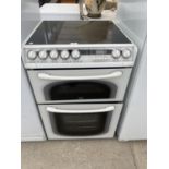 A WHITE CREDA FREE STANDING DOUBLE OVEN AND HOB BELIEVED IN WORKING ORDER BUT NO WARRANTY