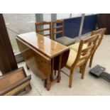 A MODERN PINE DROP-LEAF TABLE AND FOUR CHAIRS