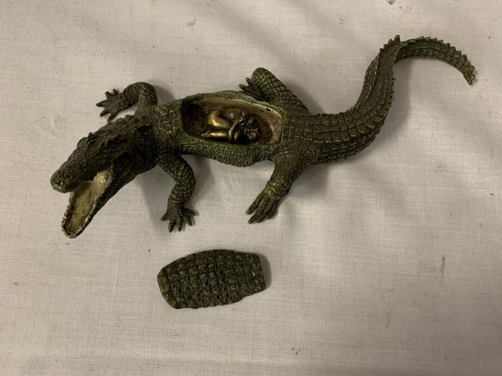 A FRANZ BERGMAN STYLE COLD PAINTED BRONZE CROCODILE WITH A REMOVABLE AND A CURLED UP LADY INSIDE