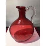 A CRANBERRY GLASS JUG