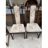 A PAIR OF ERCOL DINING CHAIRS WITH UPHOLSTERED SEATS AND BACKS