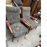 A PAIR OF PARKER KNOLL STYLE FIRESIDE CHAIRS