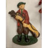 A PAINTED CAST IRON DOOR STOP IN THE SHAPE OF A GOLFER CARRYING HIS CLUBS