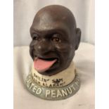 A VINTAGE STYLE CAST IRON MONEY BOX 'THE SALTED PEANUT MAN'