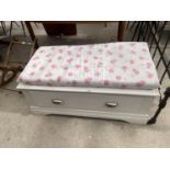 A MODERN BEDDING CHEST WITH CUSHION TOP