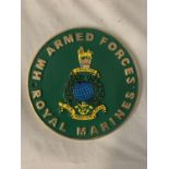 A CAST CIRCULAR ROYAL MARINES SIGN