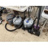 A GROUP OF FOUR VACUUM CLEANERS TO INCLUDE TWO NILFISK VP300 ETC