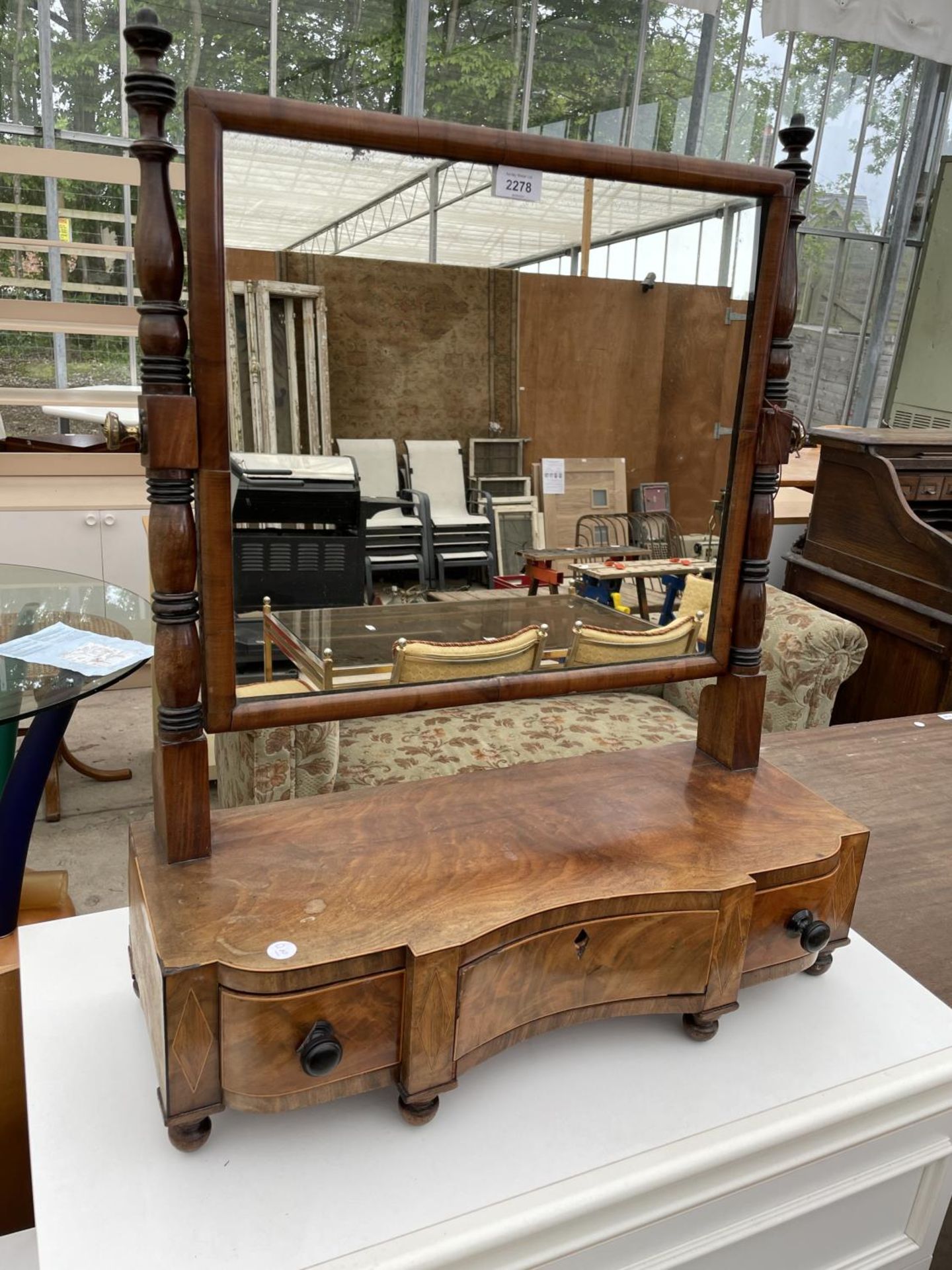 A 19TH CENTURY MAHOGNY SWING FRAME VANITY MIRROR WITH THREE DRAWERS, ON TURNED LEGS