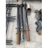 THREE CAST IRON BOLLARDS