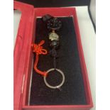 AN ORIENTAL HANGING GOOD LUCK CHARM IN A PRESENTATION BOX