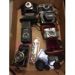 A BOX OF CAMERAS AND ACCESSORIES
