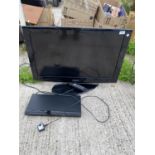 A SAMSUNG FLAT SCREEN TV AND A SONY DVD PLAYER