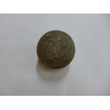 A STONE BALL (POSSIBLY A CANNONBALL) 9CM DIAMETER